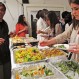 Board member P.K. Ramani serves guests