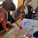Benefit attendees traced their own migratory paths